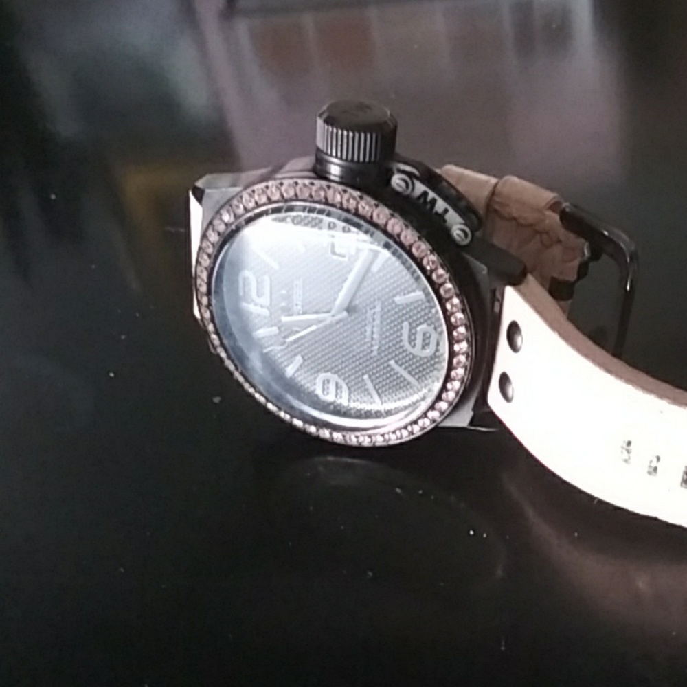 Large ladies watch with pink crystals